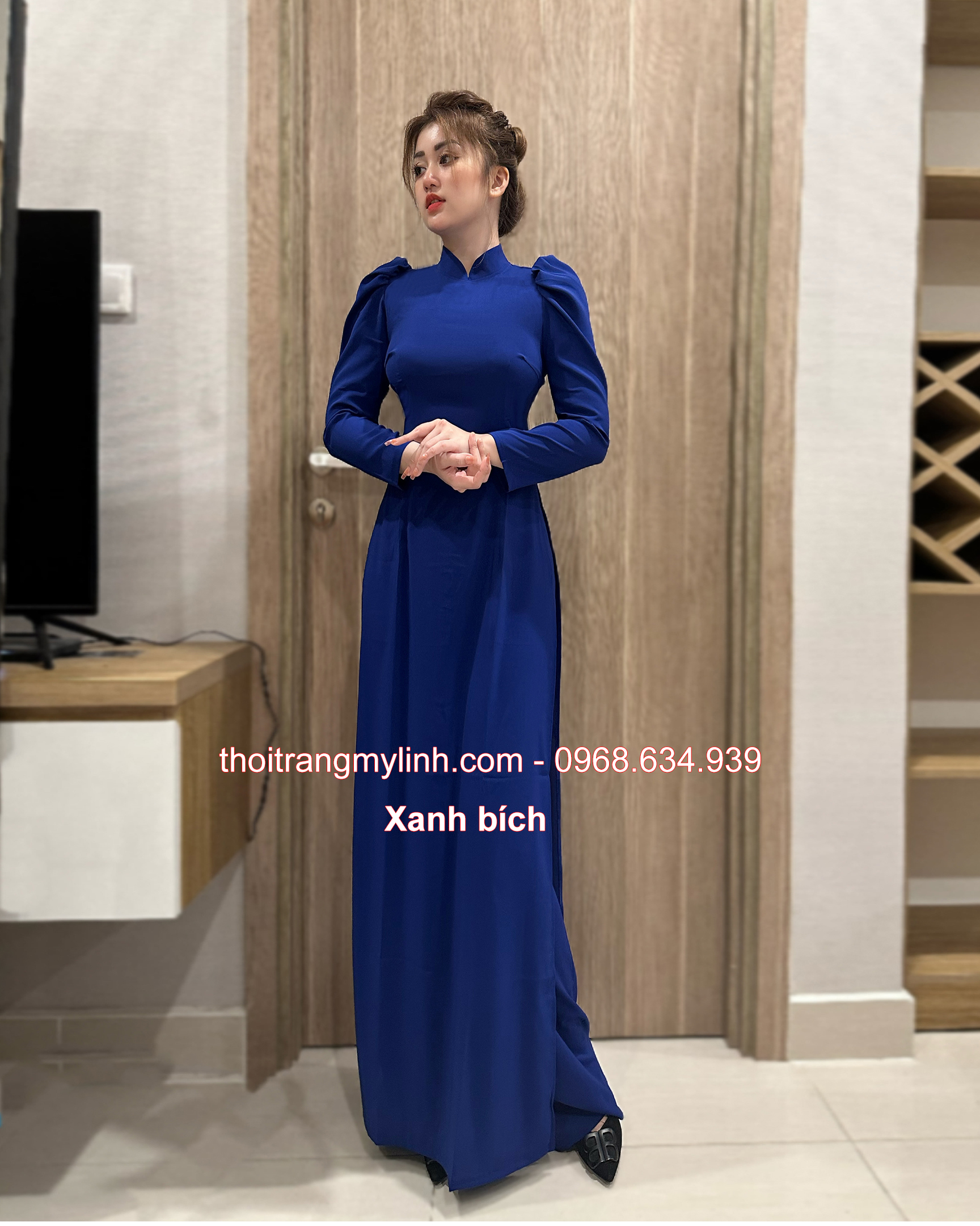 Áo dài cổ 3 phân tay phồng, dài màu xanh bích