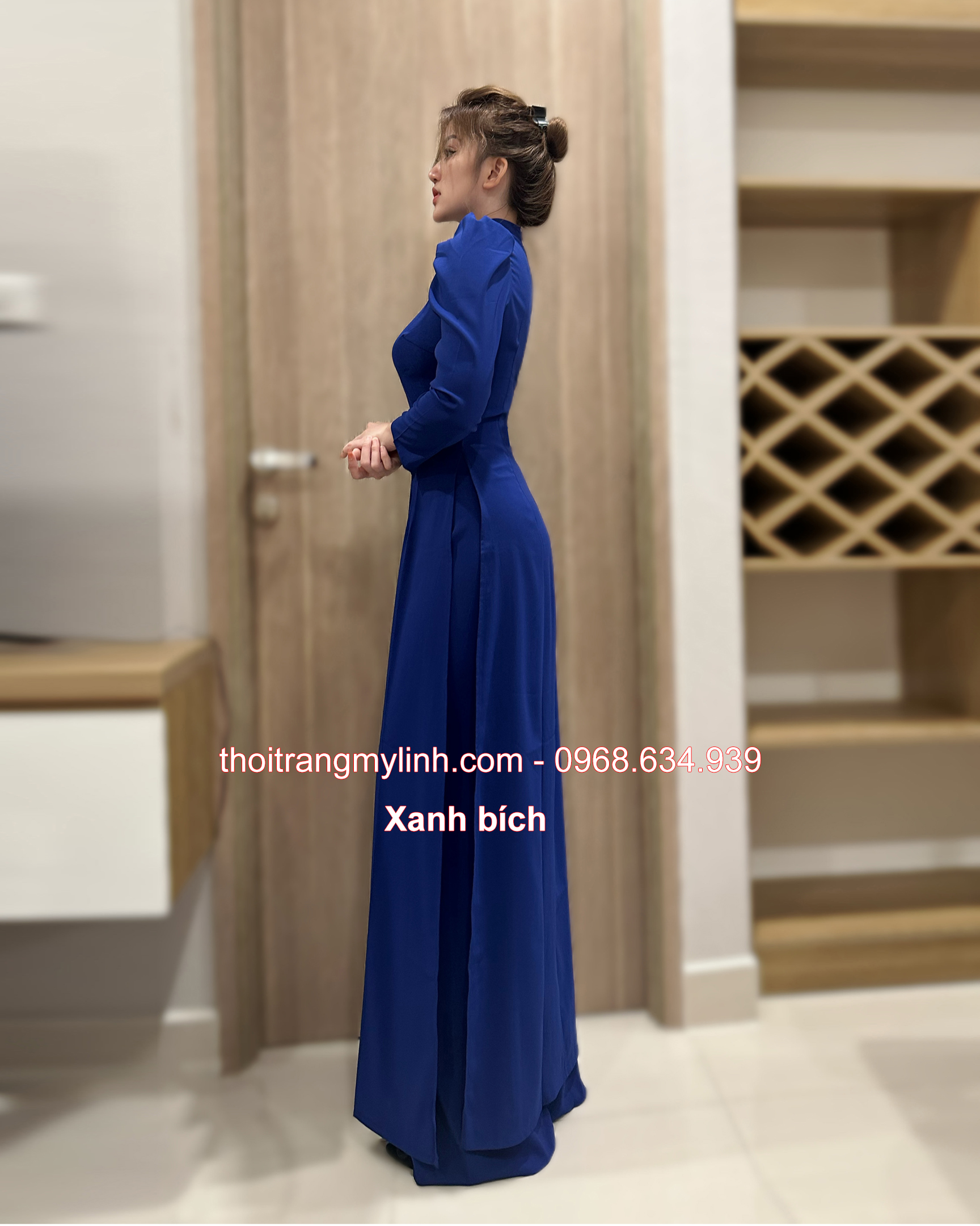 Áo dài cổ 3 phân tay phồng, dài màu xanh bích